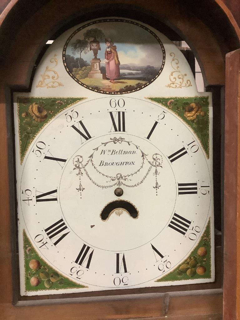 An early 19th century inlaid oak eight day longcase clock with painted dial marked William Bellman of Broughton, height 224cm